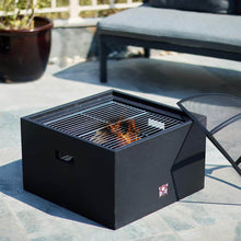 Bad Axe Log Cabin premium outdoor wood-fired fire pit for backyard and patio use