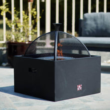 Bad Axe Log Cabin premium outdoor wood-fired fire pit for backyard and patio use