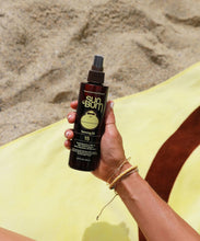 Sun Bum Premium Browning Oil SPF 15 bottle for natural deep tanning