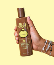 Sun Bum SPF 15 browning lotion 8.5 oz moisturizing tanning sunscreen bottle for natural tan and UV protection
